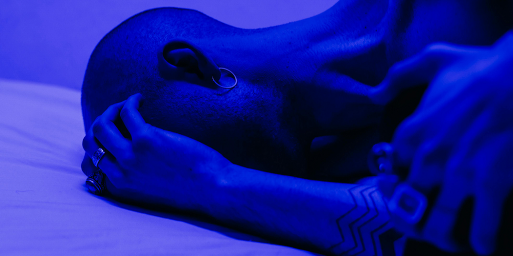 Image from cottonbro studio depicting someone holding their head in representation of narcissistic abuse and reality distortion