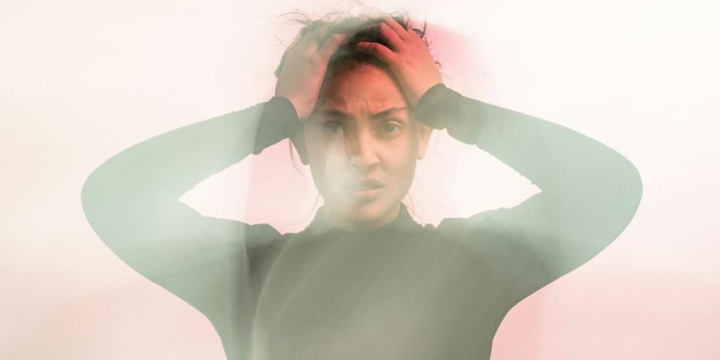 Forever layoffs image showing stressed and anxious woman