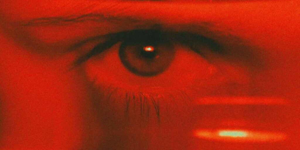 close up image of an eye looking intense used to depict dehumanization