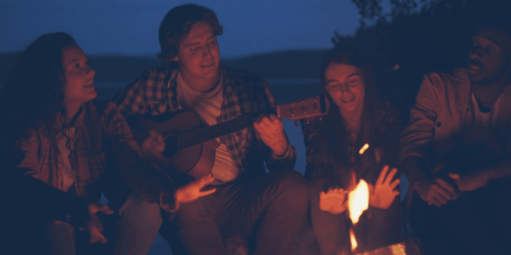 Brand storytelling depicted through people sitting around a campfire